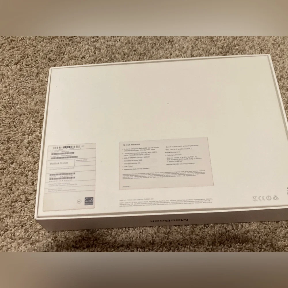 Apple MacBook 12 inch product box, instructions, and pamphlet
